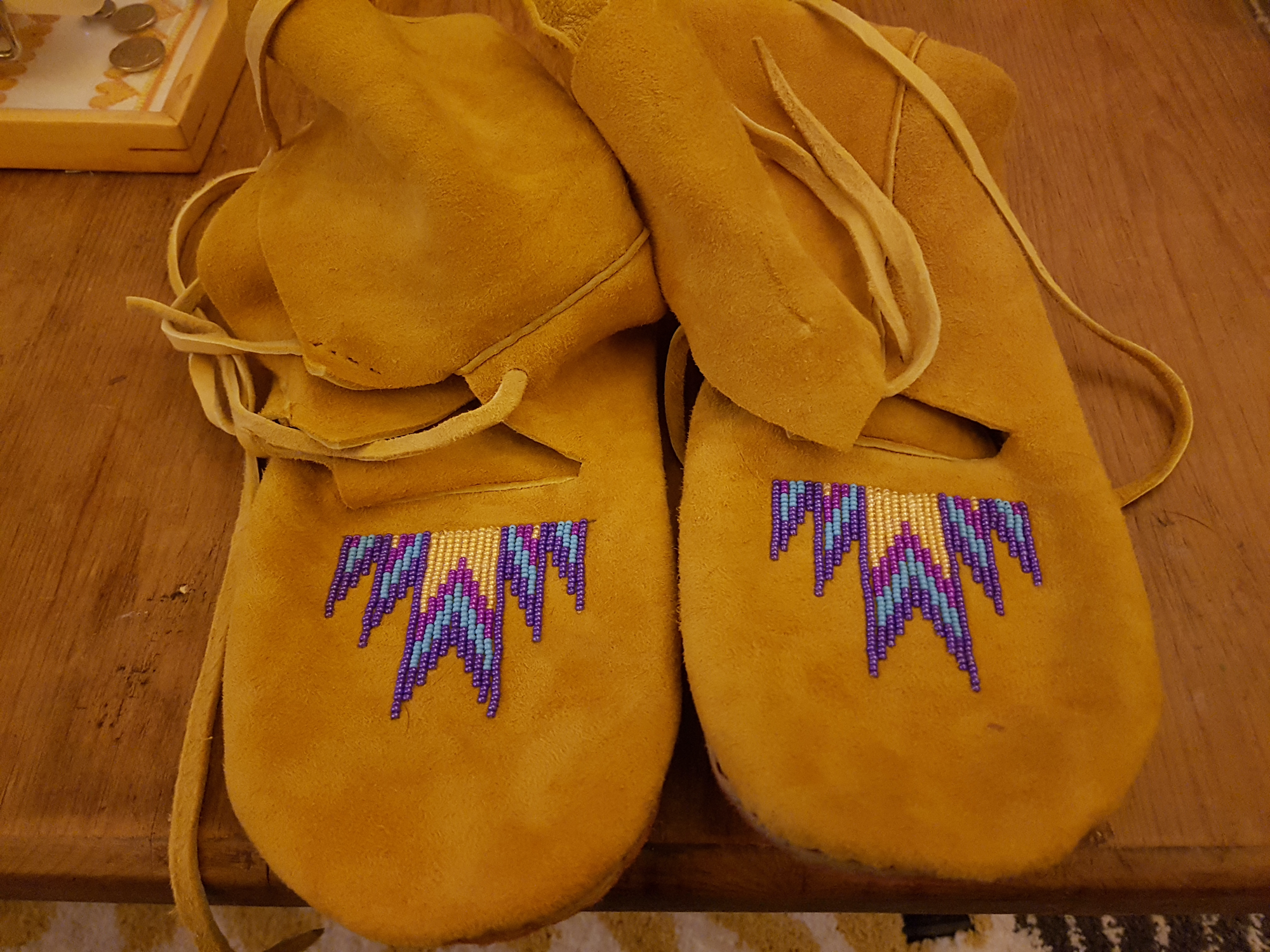 A pair of brown moccasins.